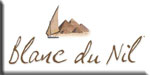 Blanc du Nil, tan-enhancing white clothing